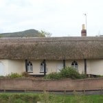 Thatched cottage before
