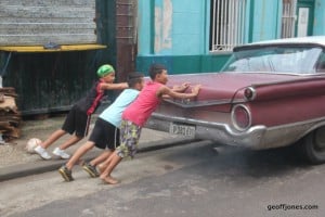 Right lads push! starting a car in Havana